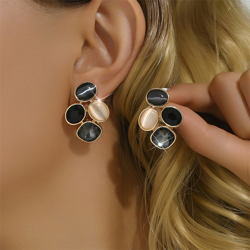 785-019543ae-927c-75c9-8fdc-195833adea10.jpg Aretes negros - Imagen 1